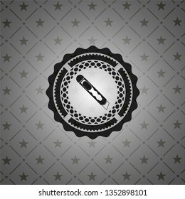 cutter icon inside black emblem