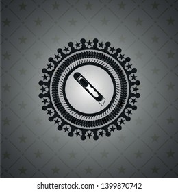 cutter icon inside black emblem