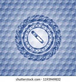 cutter icon inside blue badge with geometric pattern.