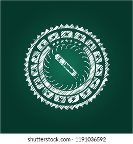 cutter icon inside chalkboard emblem