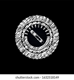 cutter icon inside chalkboard emblem on black board