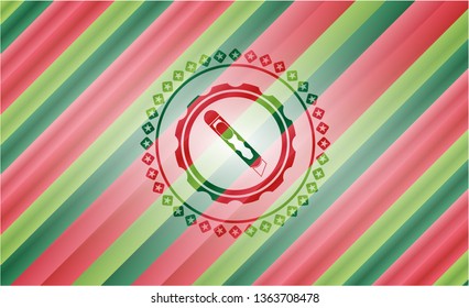 cutter icon inside christmas colors emblem.