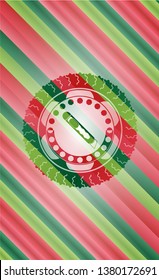 cutter icon inside christmas colors badge.