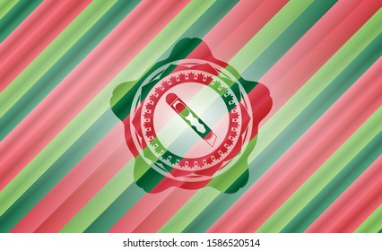 cutter icon inside christmas colors badge.
