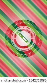 cutter icon inside christmas emblem.