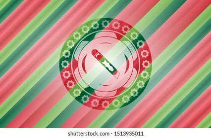 cutter icon inside christmas emblem.