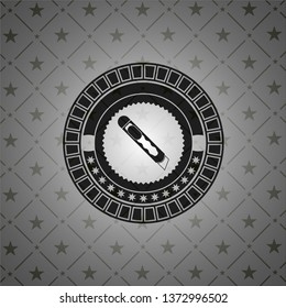 cutter icon inside dark badge