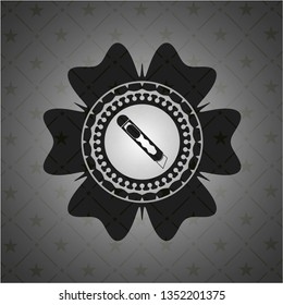 cutter icon inside dark emblem