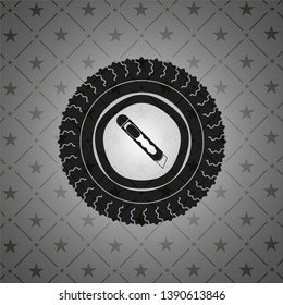 cutter icon inside dark emblem. Retro