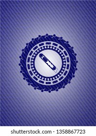 cutter icon inside emblem with jean background