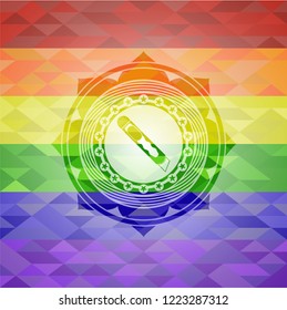 cutter icon inside emblem on mosaic background with the colors of the LGBT flag