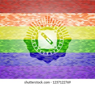 cutter icon inside emblem on mosaic background with the colors of the LGBT flag