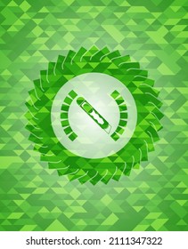 cutter icon inside green emblem with mosaic background. 