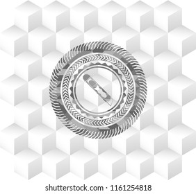 cutter icon inside grey badge with geometric cube white background
