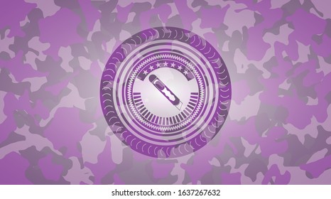 cutter icon inside pink camouflaged emblem