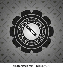 cutter icon inside realistic dark emblem