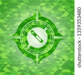 cutter icon inside realistic green emblem. Mosaic background