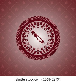 cutter icon inside realistic red emblem