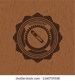 cutter icon inside realistic wood emblem