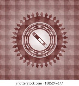 cutter icon inside red badge with geometric pattern background. Seamless.