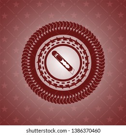 cutter icon inside red emblem