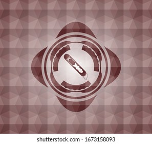 cutter icon inside red seamless emblem with geometric background.