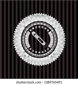 cutter icon inside silver badge or emblem