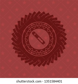 cutter icon inside vintage red emblem