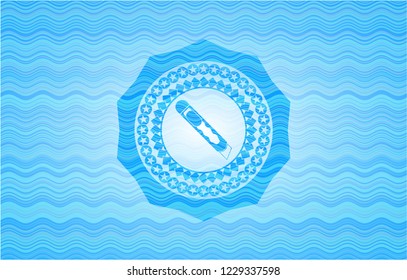 cutter icon inside water style emblem.