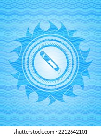 cutter icon inside water style emblem. 