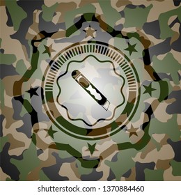 cutter icon on camo texture