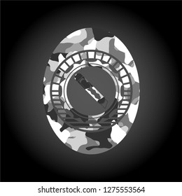cutter icon on grey camo texture