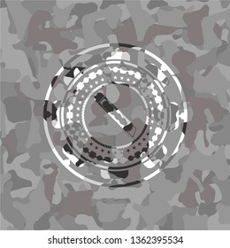 cutter icon on grey camo pattern