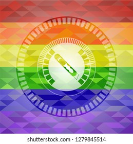 cutter icon on mosaic background with the colors of the LGBT flag