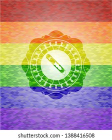 cutter icon on mosaic background with the colors of the LGBT flag
