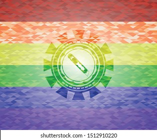 cutter icon on mosaic background with the colors of the LGBT flag