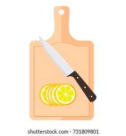 Cutting board with lemon and kitchen knife