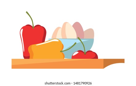 cutting board pepper apple bowl eggs cooking
