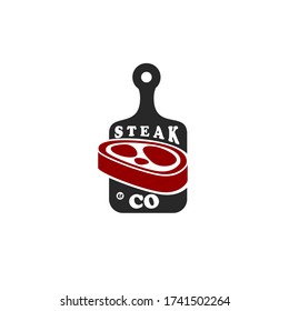 Cutting board with red meat and text isolated on white background good for restaurant identity and logo or promotional purpose