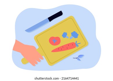 Cutting board with vegetables in human hand. Man cooking, cutting carrot, tomato and broccoli, making soup flat vector illustration. Dinner, food concept for banner, website design or landing web page