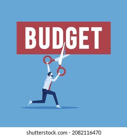 Cutting budget concept businessman using scissors to cutting word budget