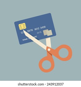 cutting up credit card with scissors 