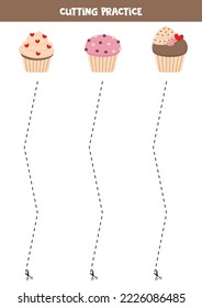 Cutting practice for preschool kids. Cut by dashed line. cartoon cupcakes.
