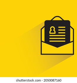 cv in envelope with shadow on yellow background