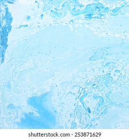 Cyan marble texture made with oil paints.