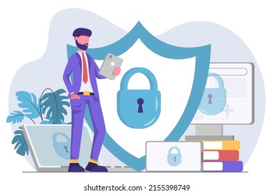 Ciberseguridad. Un hombre de negocios se encuentra junto a un escudo que protege sus dispositivos.