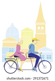 CYCLIST COUPLE. IN CITY