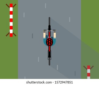 A cyclist in a helmet. View from above. Vector illustration in a flat style.