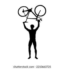 A Cyclist Holds A Bicycle Above His Head. Black Cyclist.