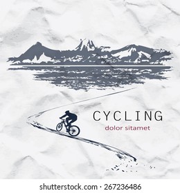 Cyclist on the background of crumpled paper